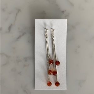 Silver dangly earring
